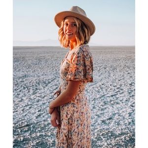 The Adventure Dress it’s a wrap dress with a midi length 100% soft Rayon